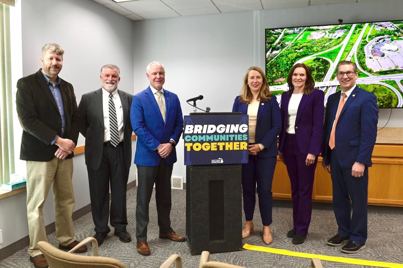 Mark Huizenga bipartisan leader legislation signing with family